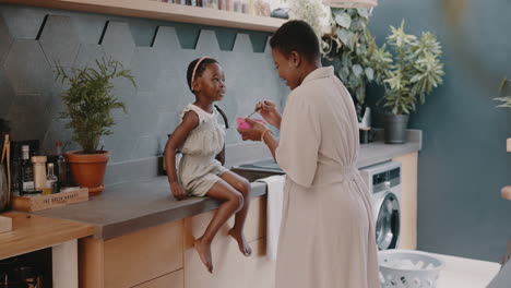 mother, child and breakfast with mom feeding girl