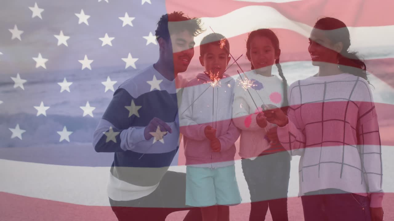 animación de la bandera de los estados unidos de américa sobre una pareja biracial con niños a orillas del mar