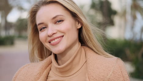 young woman smiling at the camera.