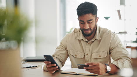 Business-man,-credit-card-and-phone-for-happy