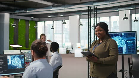 happy female engineer in office automating repetitive tasks using ai scripts