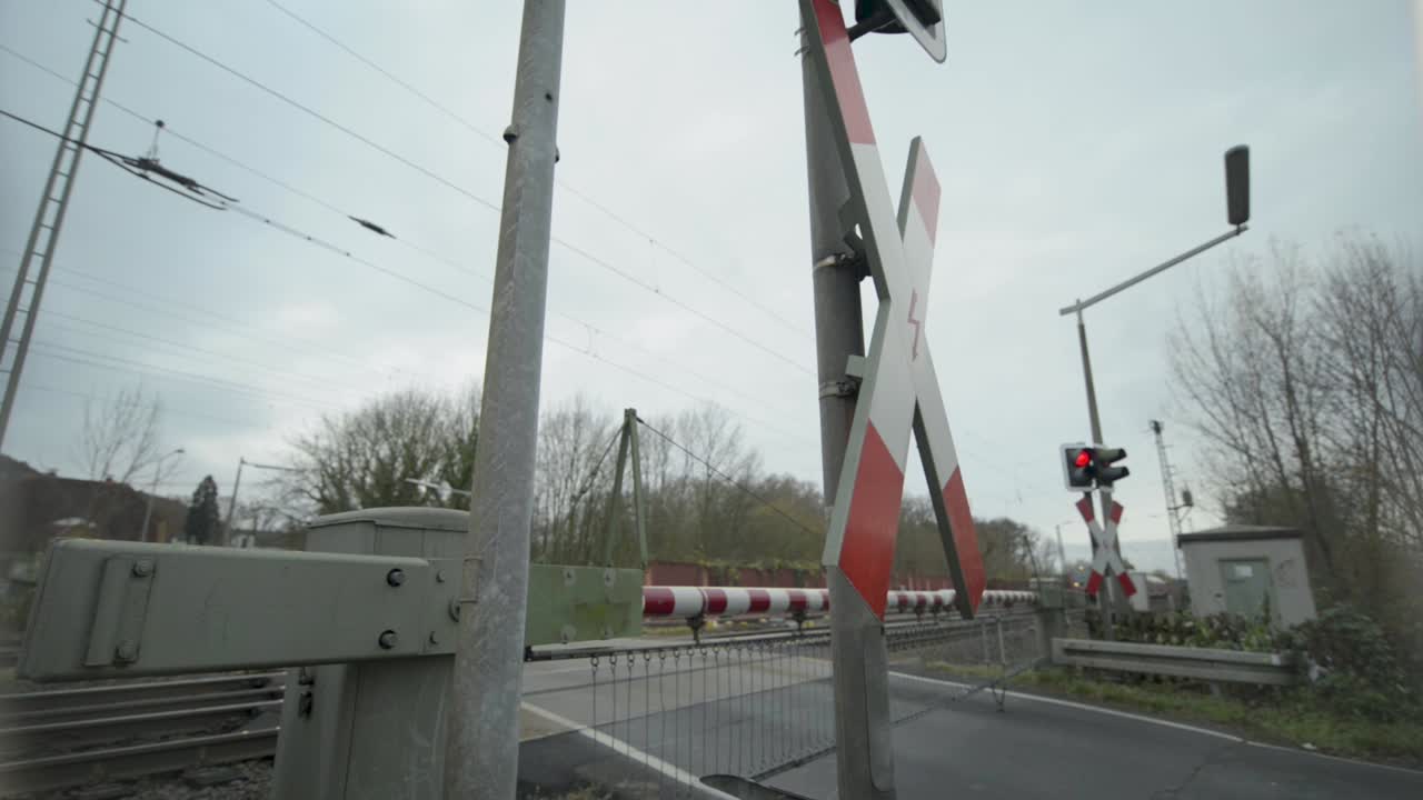 German Railway Crossing with Train Approaching