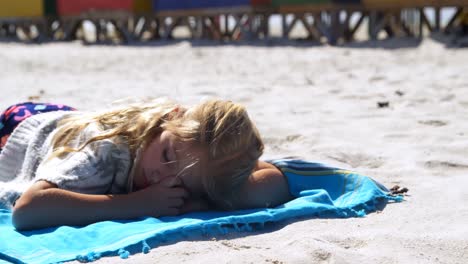 girl sleeping in the beach 4k