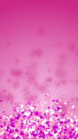 colorful confetti love hearts flying on pink blurred soft romantic wedding background. looped motion graphics. copy space. vertical video.
