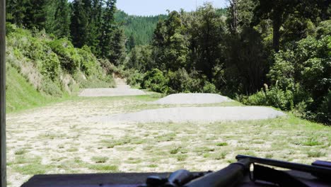 Earth-Mounds-Surrounded-By-Greenery-In-An-Outdoor-Shooting-Range