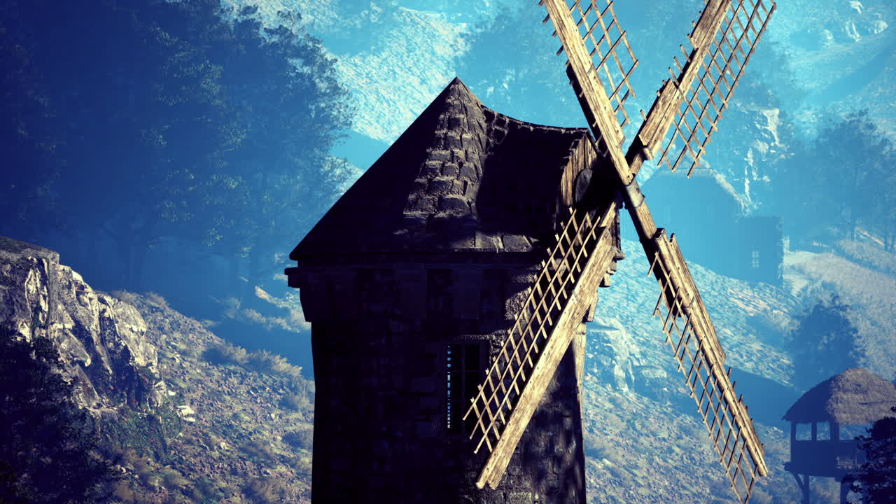 Ancient Windmill in a Mountain Valley