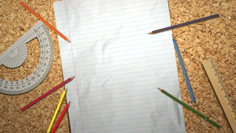 closeup table of student with notebook and pencil school background