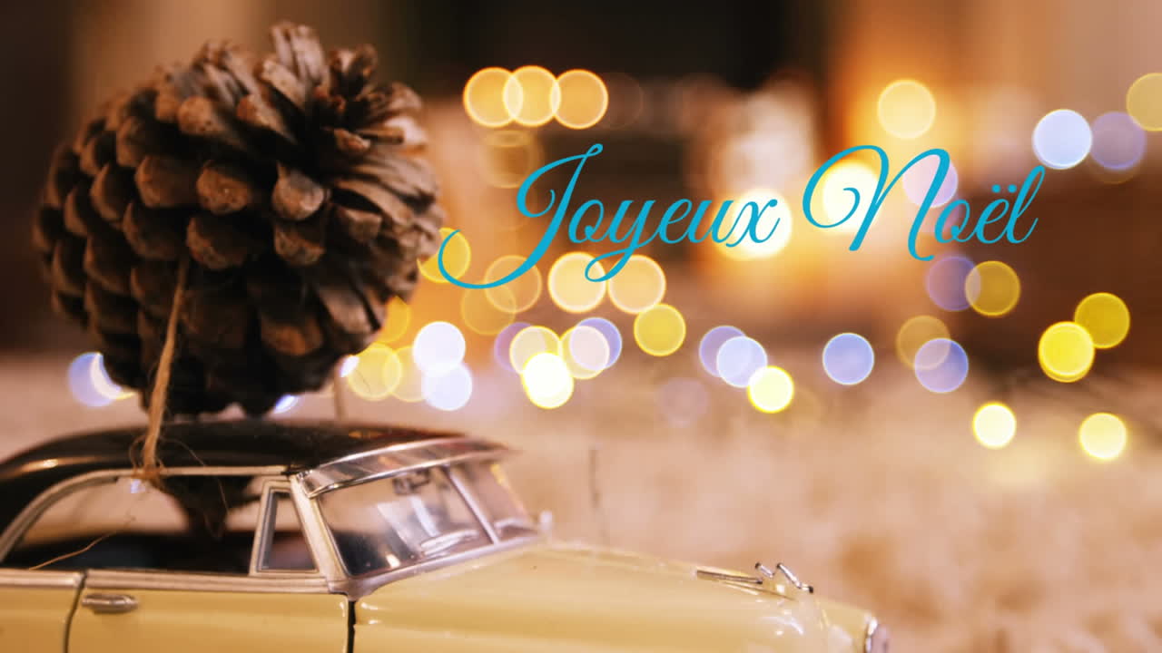 joyeux noël escrito sobre las decoraciones de navidad