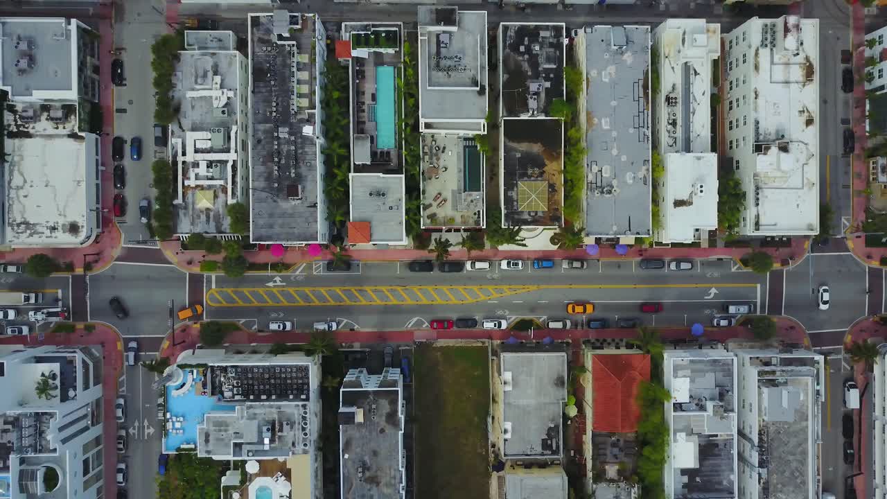 Collins Avenue, South Beach, Miami, Florida USA. Top Down Aerial View of Traffic and Small Hotels