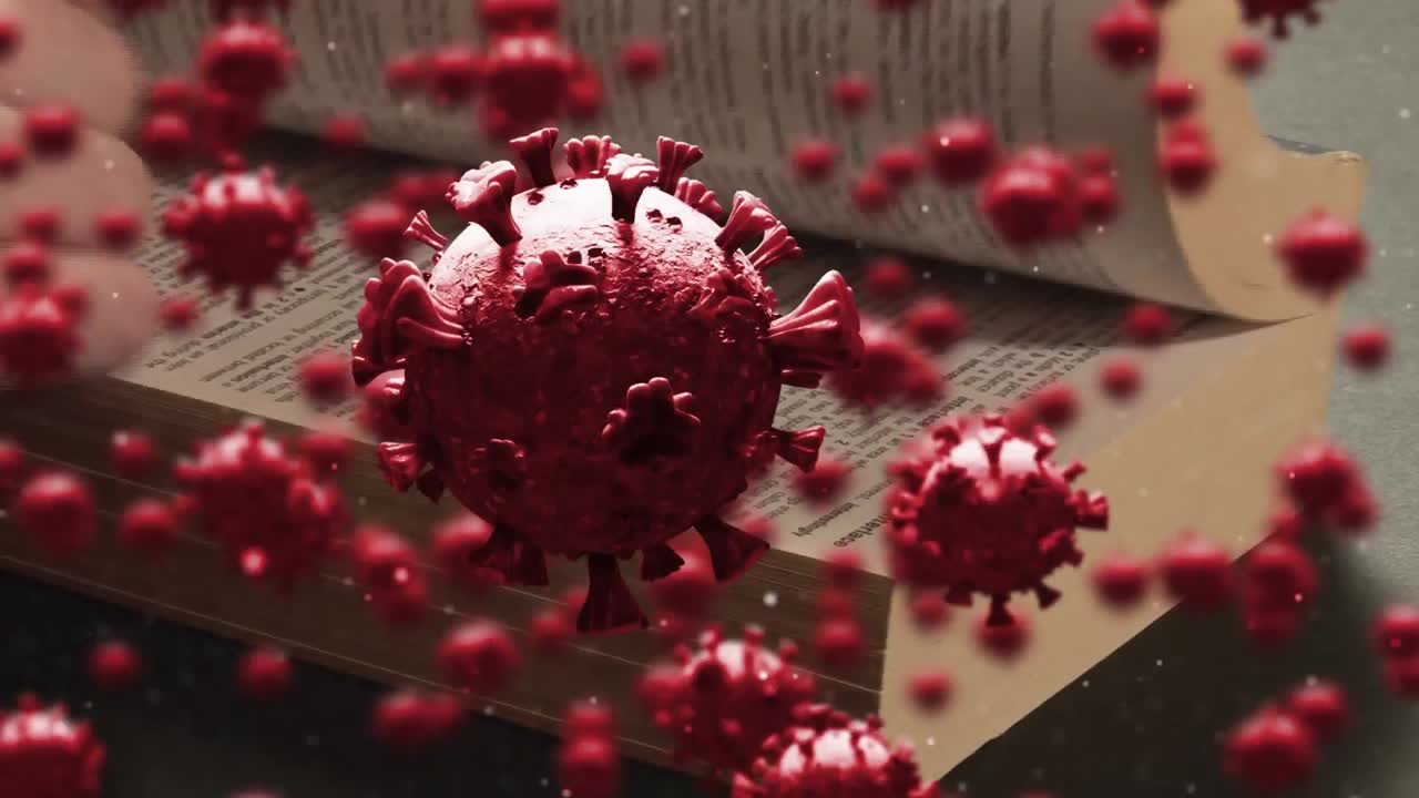 células de covid-19 moviéndose contra las manos tocando y leyendo la biblia