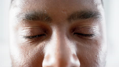 Portrait-of-happy-eyes-of-african-american-man-in-hospital,-slow-motion