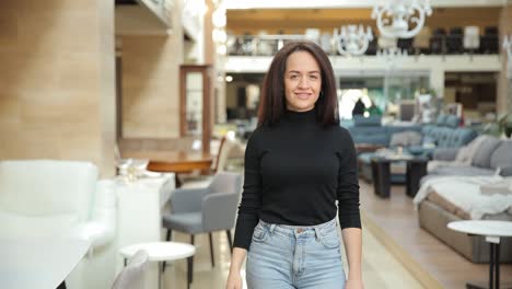 a young woman walks through a chic furniture store stylishly showcasing modern design trends a young woman walks through a chic furniture store stylishly showcasing modern design trends