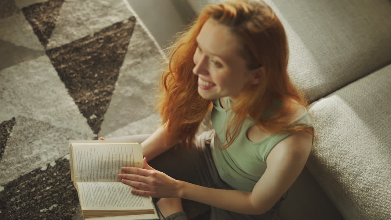 Caucasian woman reading story on book