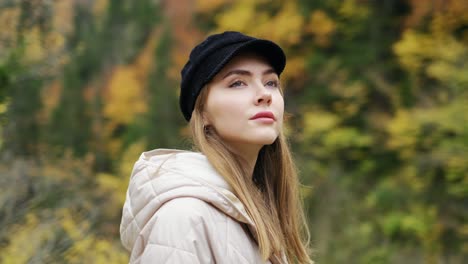 beautiful young girl enjoying nature in autumn