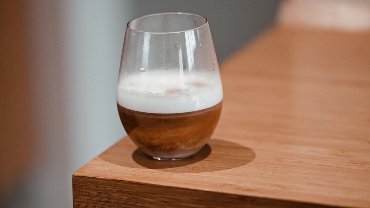Coffee with milk on a kitchen counter top