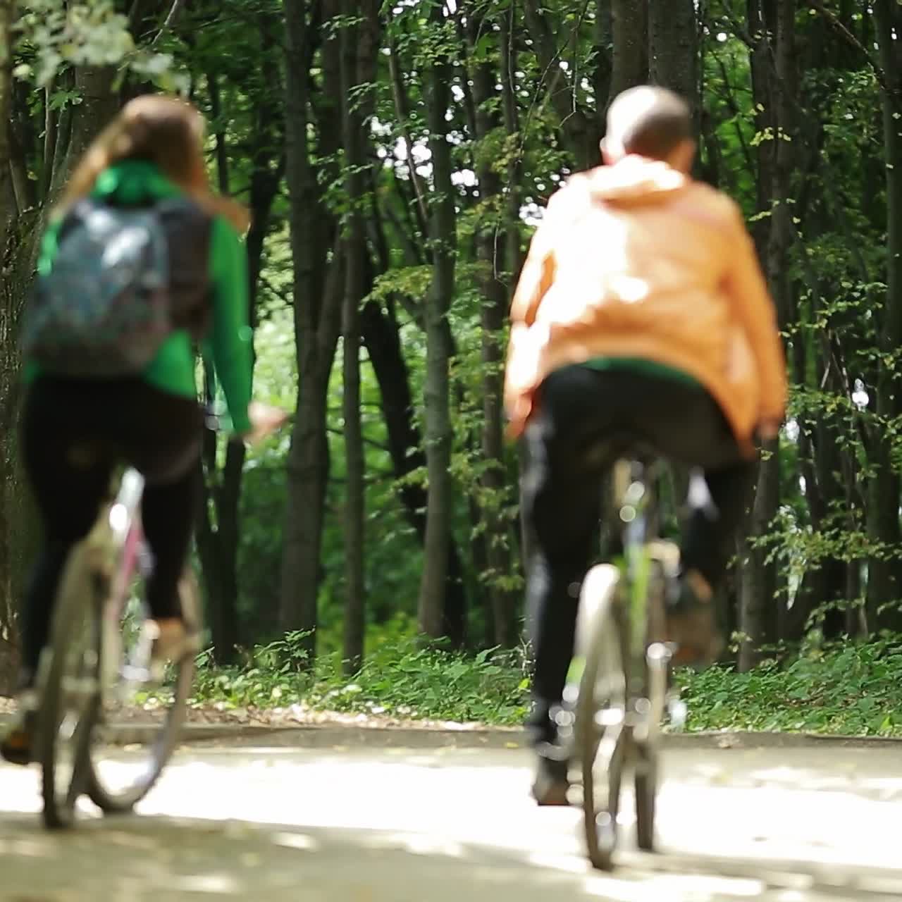 Couple Of Romantic Lovers Cycling