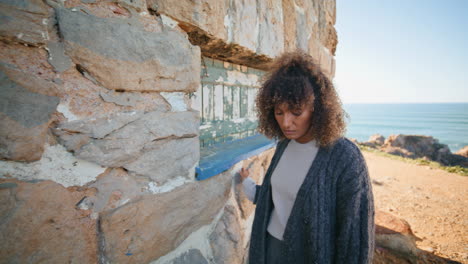 melancholy girl thinking alone at abandoned place closeup. woman contemplating