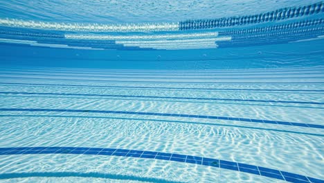 olympic swimming pool under water background.