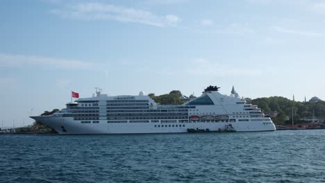 large white luxury cruise ship at the dock of istanbul sarayburnu