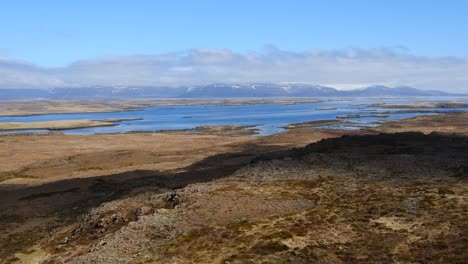 aerial view over fjord and mountains in iceland