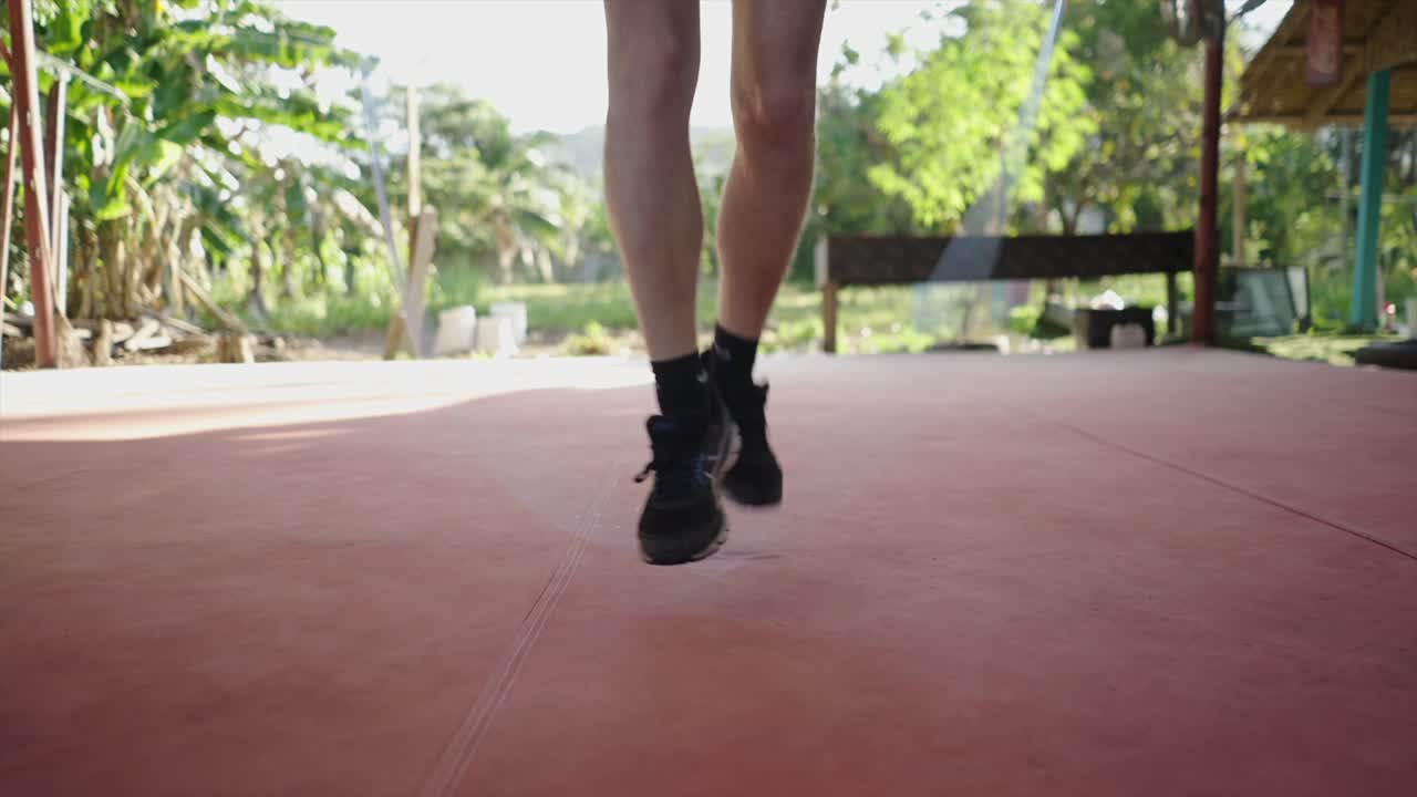 Person Jumping Rope Outdoors