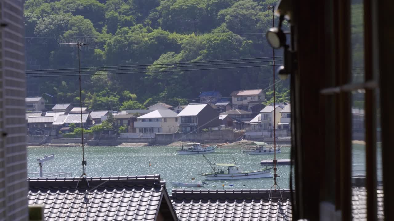 Stunning slow motion slider over beautiful seaside village in Japan