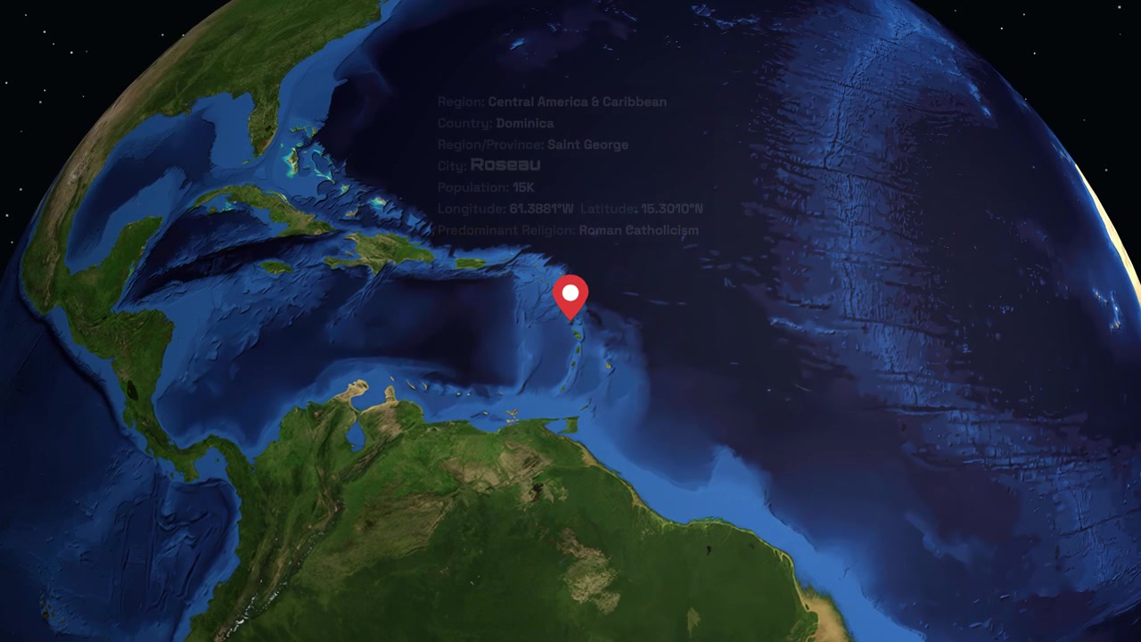 A digital globe rotates and zooms into Roseau, Dominica, displaying geographic and demographic data