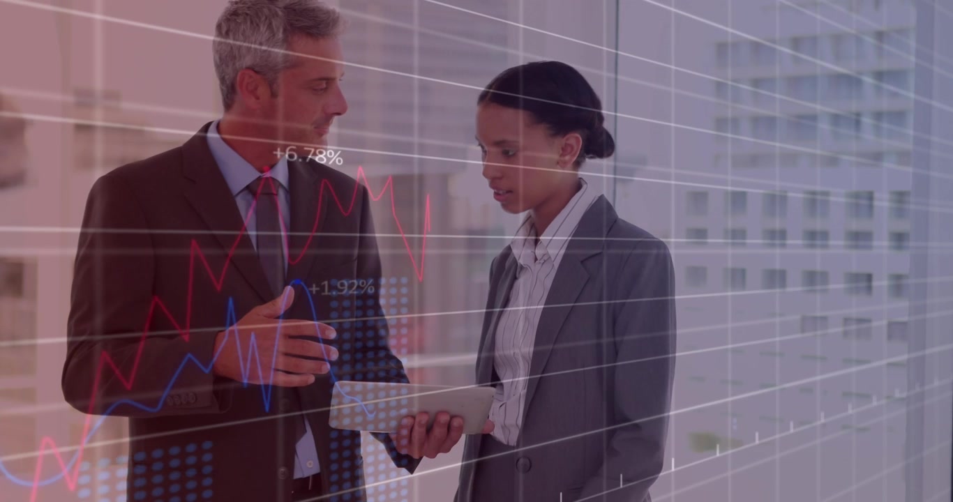 Animation of data processing against diverse businessman and businesswoman discussing at office