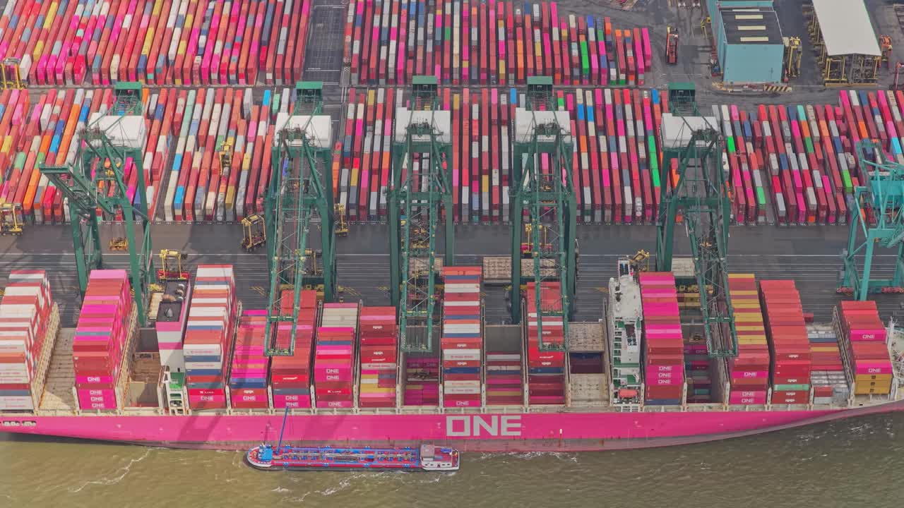 Aerial wide shot of Antwerp container port with cranes, Belgium