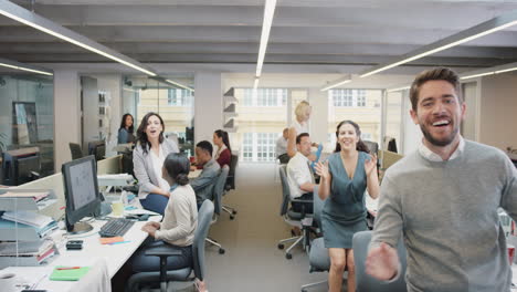 congratulations businessman receiving praise as team members clap in applause celebrating victory on return to office slow motion walk pov shot concept series