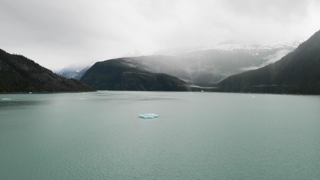 Holkham Bay (Sumdum Bay), Endicott Arm fjord, Alaska. Entering the Endicott Arm fjord in a foggy morning.