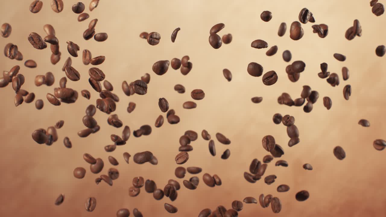 Fragranza di chicchi di caffè che fluttuano nell'inquadratura. Chicchi di caffè ripresi con una fotocamera super slow motion a 1000 fps.