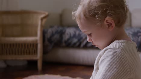 close up view of baby in living room at home