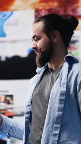 vertical video modern online lifestyle of a young man checking real time notifications