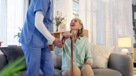 nurse assisting elderly woman with walking stick