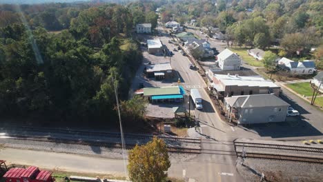 Aerial-orbit-of-charming-small-town-shops-surrounded-by-scenic-views-in-Old-Town-Helena,-Alabama