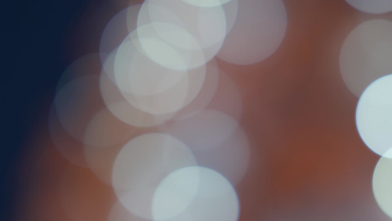 Blurred white Christmas tree lights and decoration bokeh background.