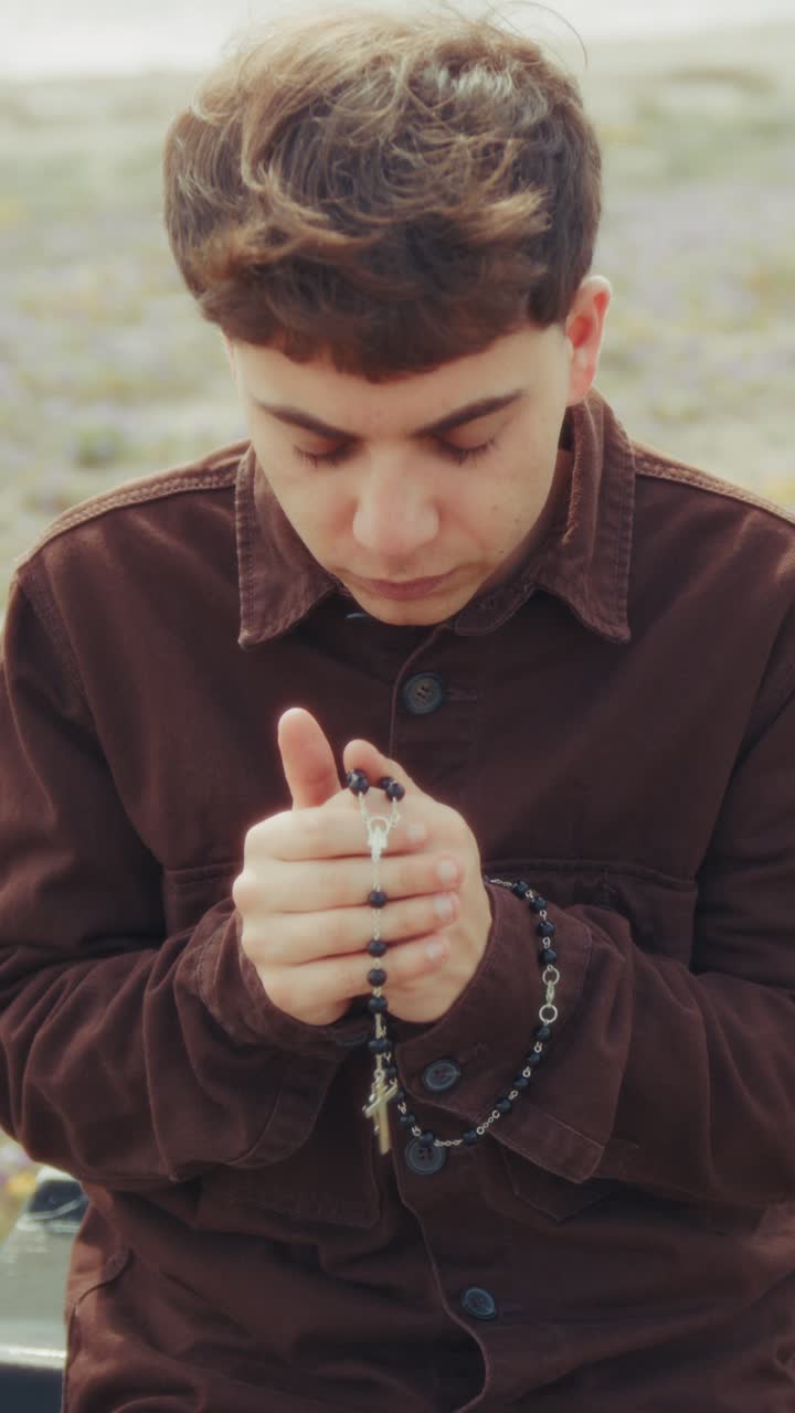 Intense Moment Of Prayer For A Christian Man On The Beach