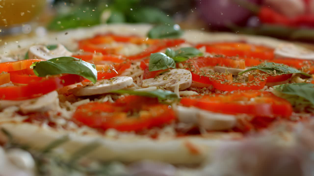 Pizza with basil, mushrooms and red pepper