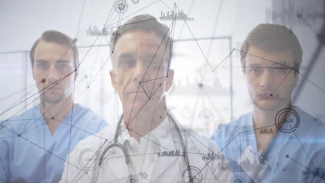 medical professionals analyzing patient data in hospital corridor, showing digital network graphics