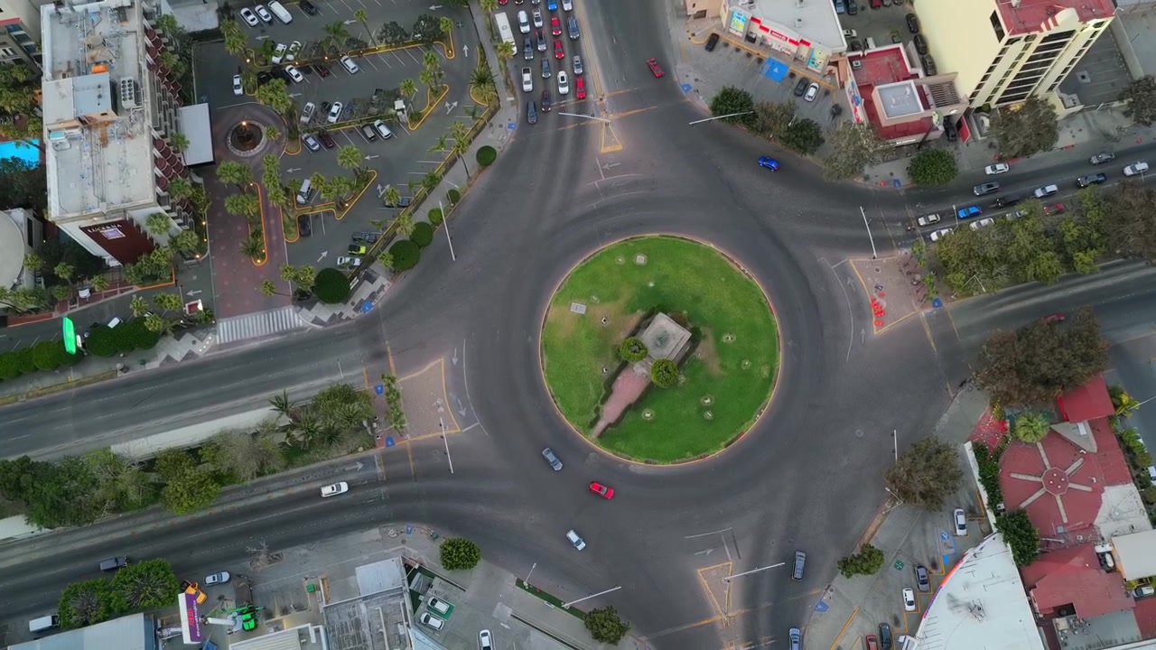Top down aerial of Monumento México roundabout on Paseo de los Héroes in downtown Tijuana, Baja California, Mexico