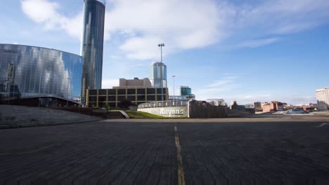 autumn city park with modern buildings