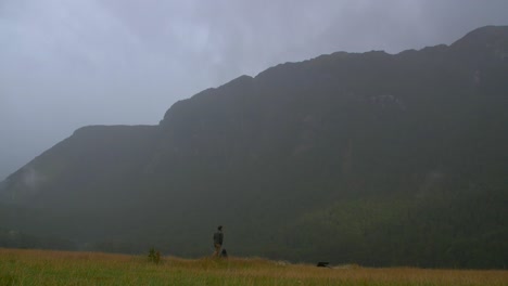 Father-and-Son-Walking-in-Rain