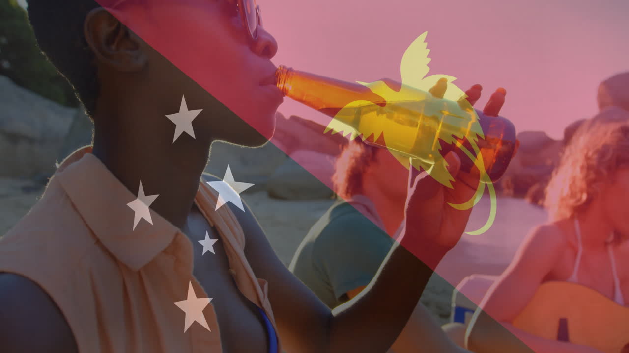 Animation overlay of Papua New Guinea flag with people having drinks at beach