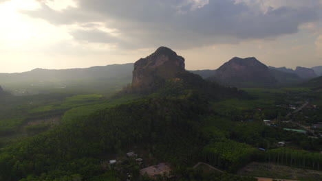 Flying-towards-limestone-karst-rocks-of-Krabi-at-sunset