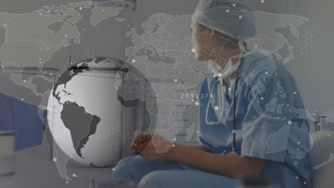 network of connections and globe over world map against stressed female health worker at hospital