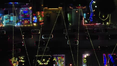 aerial topdown view along christmas winter wonderland, colorful light decoration in valencia neighborhood