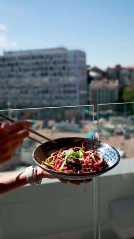 delicious asian noodles with city view