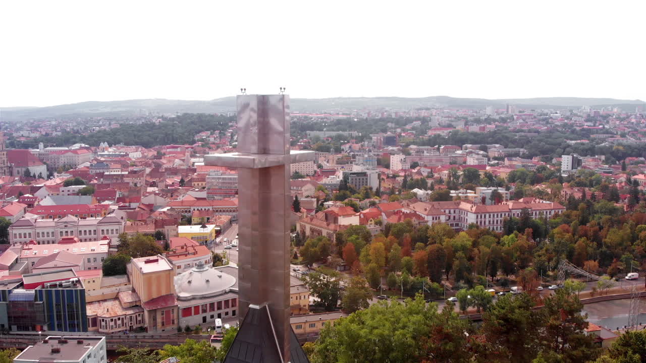 Aerial Footage of large Cross Above European City
