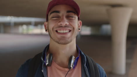 close up attractive young hispanic man student portrait of handsome man smiling happy proud